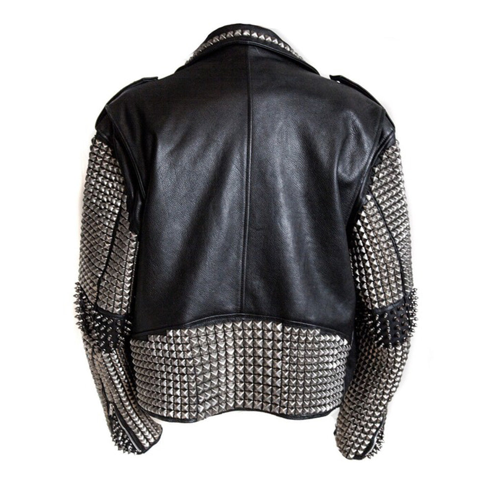 Men's black leather biker jacket with heavy silver pyramid studs and conical spikes, asymmetrical zipper, and waist belt.