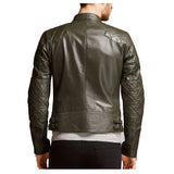 Man in slim fit olive green waxed leather biker jacket with quilted shoulders and front zipper.