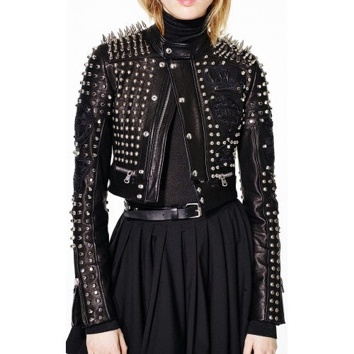 Women's cropped black studded leather jacket with silver spikes, studs, and intricate embroidery.