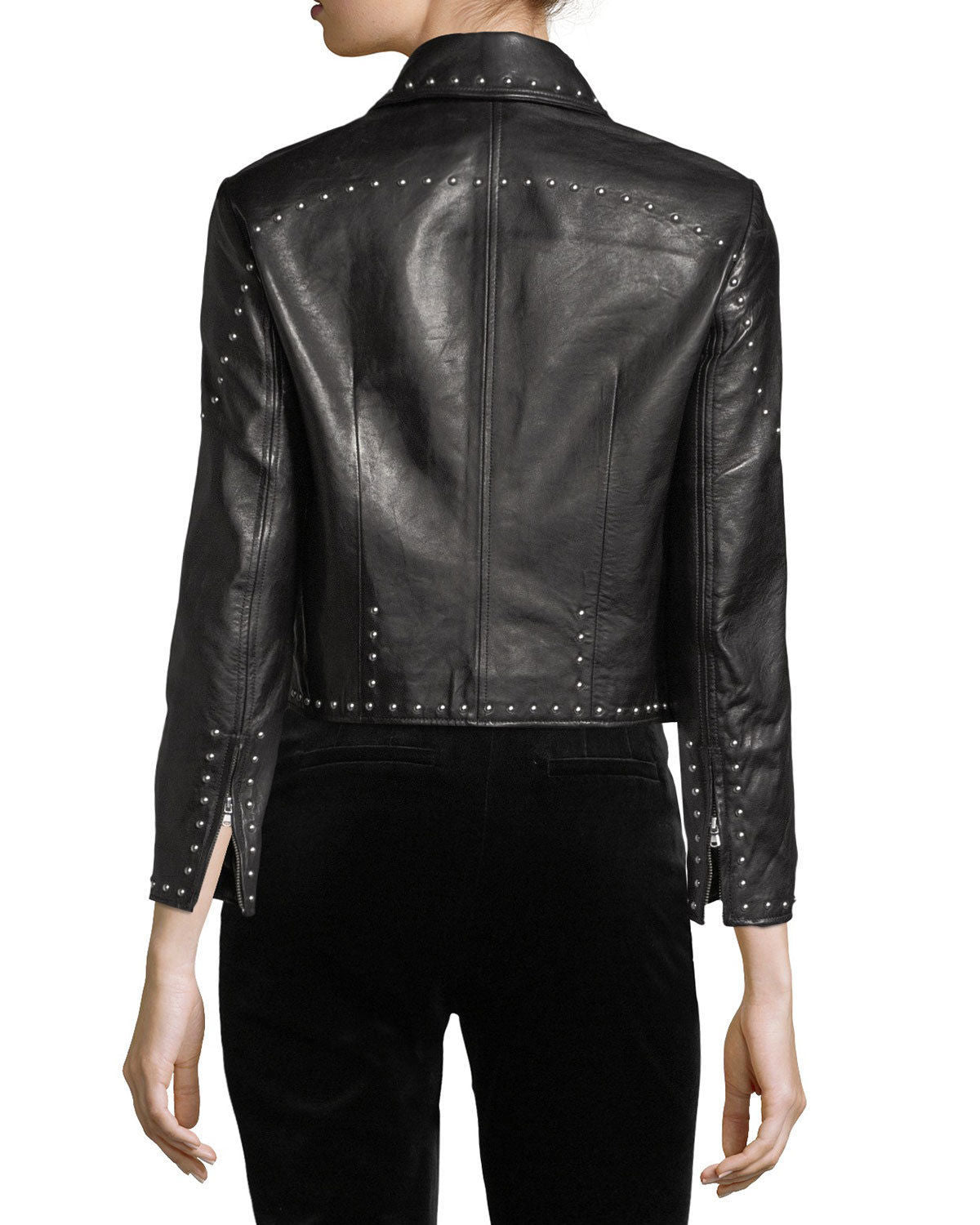 Women's black cropped studded lambskin leather jacket with silver studs outlining the seams and collar.
