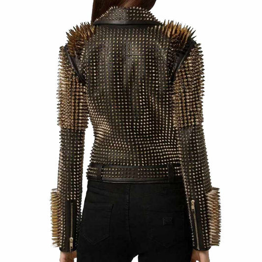 Women's black leather punk jacket heavily embellished with golden studs and long spikes.