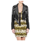 Women's studded black leather punk jacket with heavy silver spikes on the shoulders and studs on the lapels.