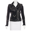 Women's black suede leather moto jacket with heavy silver stud detailing.
