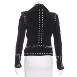 Women's studded black suede leather moto jacket with heavy silver stud detailing.
