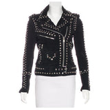 Women's black suede leather moto jacket with heavy silver stud detailing.