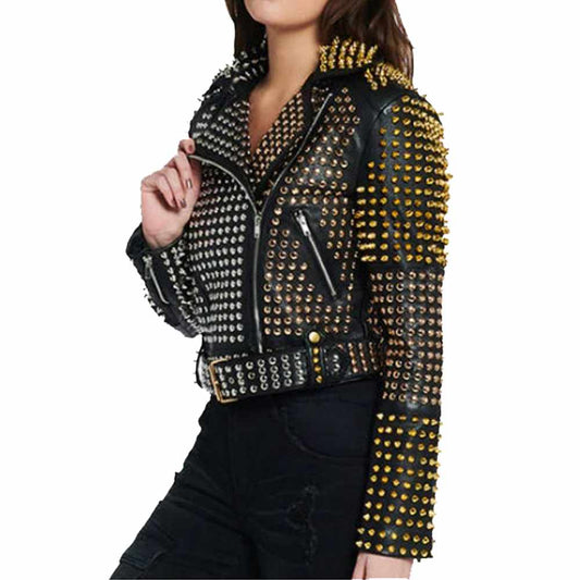 Women's studded black leather punk jacket with a split design of gold studs on one side and silver on the other.
