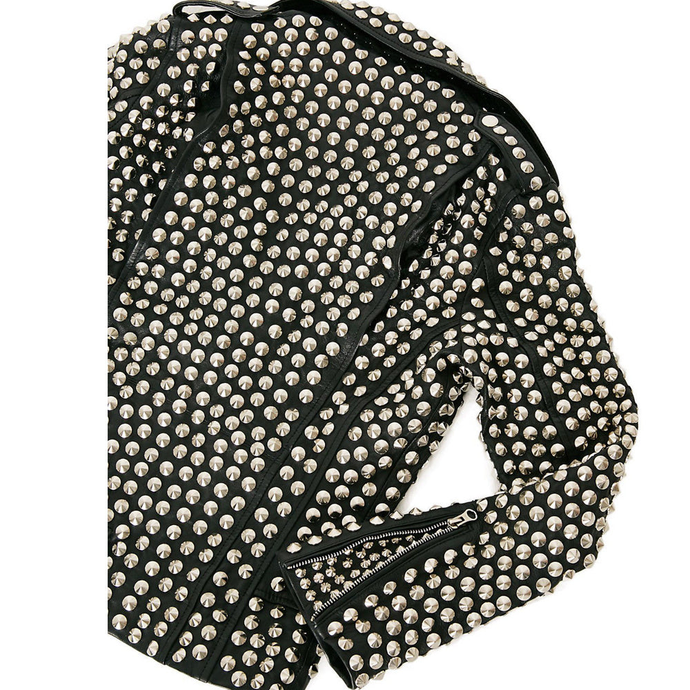 Women's black leather biker jacket fully covered in silver dome studs, rock star style with asymmetrical zipper.