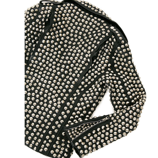 Women's black leather biker jacket fully covered in silver dome studs, rock star style with asymmetrical zipper.
