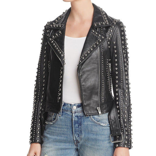 Women's black leather biker jacket with heavy silver dome studs, Brando style, featuring asymmetrical zipper and waist belt.