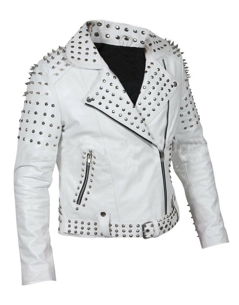 Women's white leather biker jacket with silver conical spikes on shoulders, heavy dome studs, asymmetrical zipper, and waist belt.