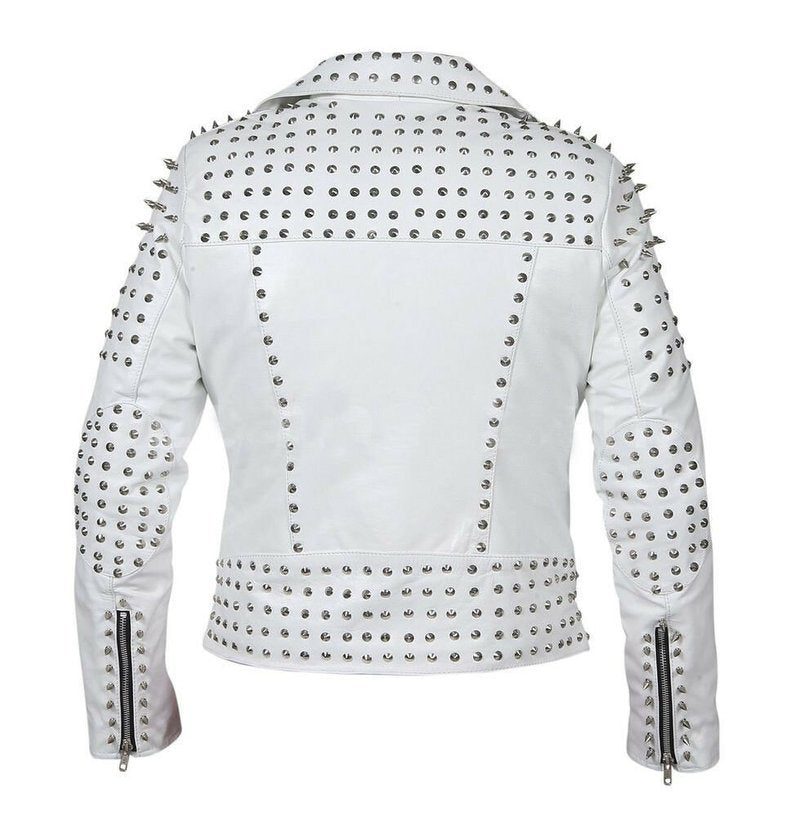 Women's white leather biker jacket with silver conical spikes on shoulders, heavy dome studs, asymmetrical zipper, and waist belt.