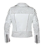 Women's white leather biker jacket with silver conical spikes on shoulders, heavy dome studs, asymmetrical zipper, and waist belt.