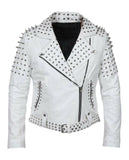 Women's white leather biker jacket with silver conical spikes on shoulders, heavy dome studs, asymmetrical zipper, and waist belt.